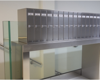 Batería 4 buzones verticales con apertura lateral Arregui Libro V1140